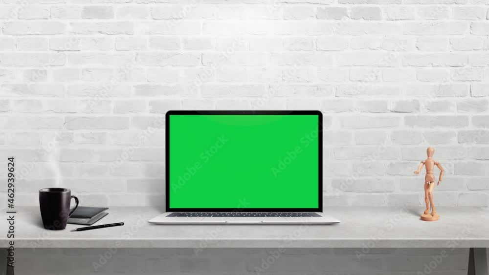 Aufkleber Laptop computer mockup on work desk. Isolated display in chroma key green for web site design presentation