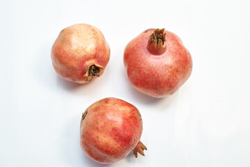 fresh pomegranate on white background