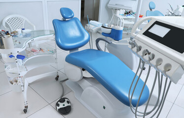 Dentist's office interior with chair and modern equipment