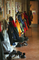 Fototapeta na wymiar School corridor with clothes hanging