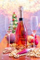 New year decoration with champagne and two flute glasses.