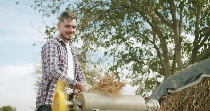 Farmer smiling and clean plant and making Traditional Straw Broom with sorghum