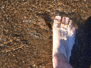 barefoot on the beach