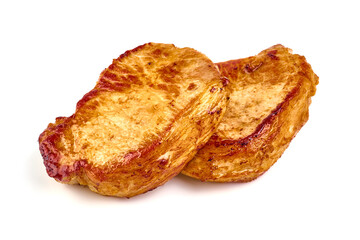 Barbecued pork steaks, isolated on white background.