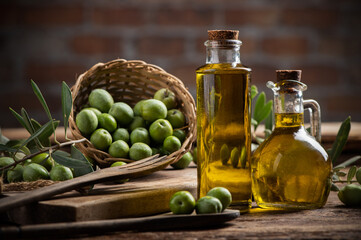Olives and olive oil in a bottles - 462950036