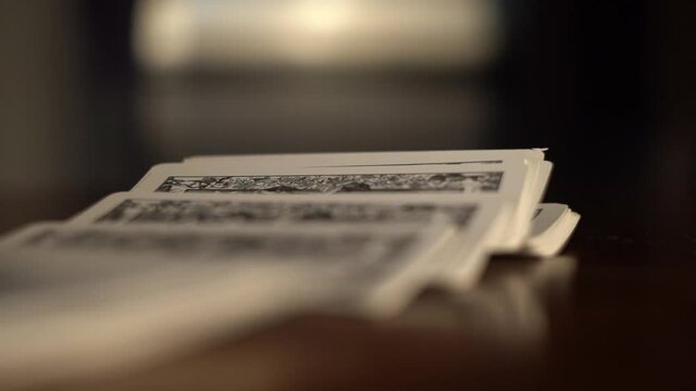 Female hands lays out a deck of Tarot cards