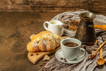 Coffee and croissant, good morning and breakfast concept