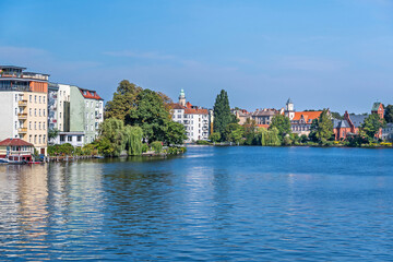 Naklejka premium Left bank of the Dahme River at the confluence with the River Spree in the old Koepenick in Berlin, Germany