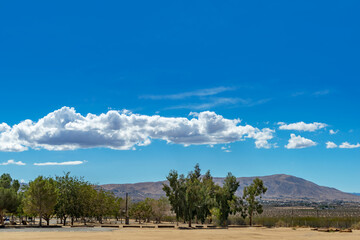 View of clouds and mountain range at Horsemen’s Center Park in Apple Valley, California