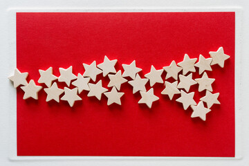 wooden stars on red