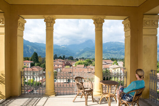 Lady Enjoys The View From A Tuscany Villa. 