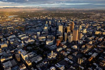 Sunrise on Downtown Denver.  Image taken from an airplane in October 2021