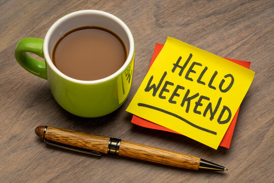 hello weekend - handwriting on a sticky note with a cup of coffee, cheerful message