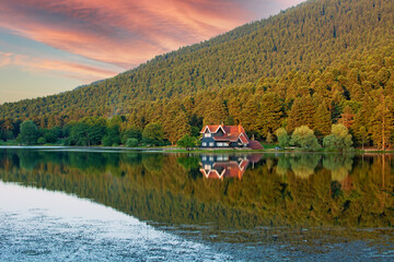 Golcuk National Park Bolu Turkey. Autumn wooden Lake house inside forest in Bolu Golcuk National Park, Turkey wallpaper.