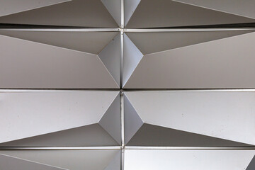 Elegant stainless steel wall in modern urban environment architecture. Textured background. Blank...