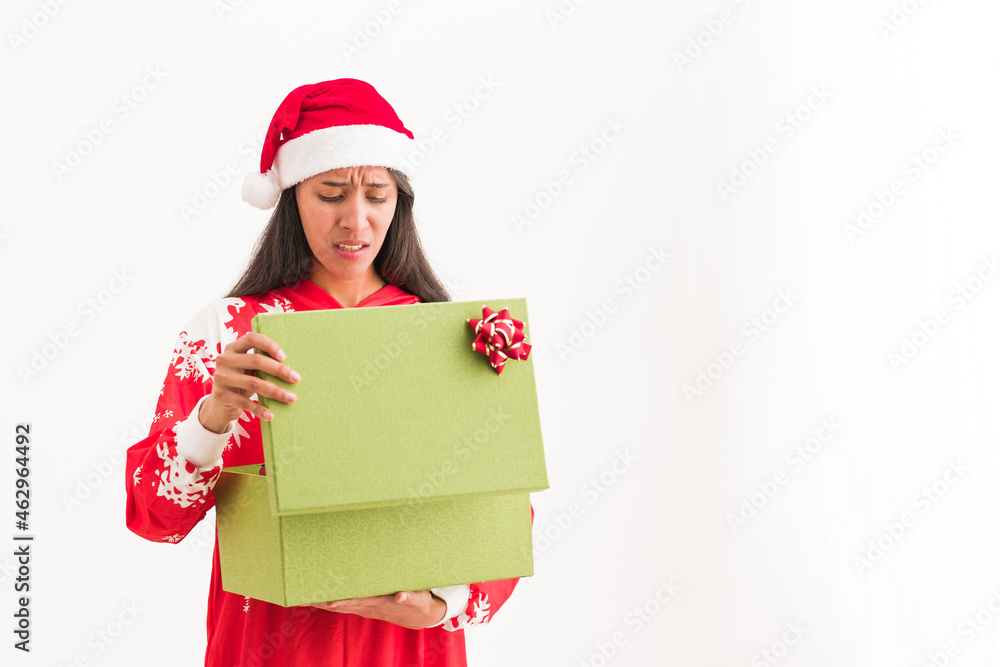 Sticker christmas gift become a bad santa idea on a unhappy woman, ugly sweater for christmas celebration