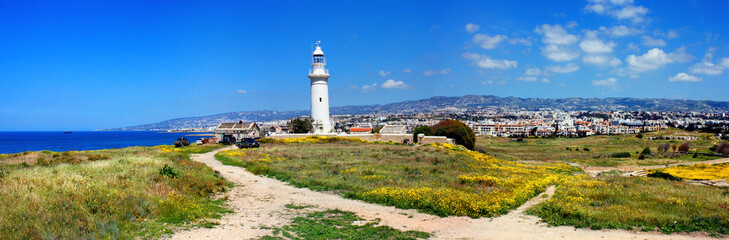 Fototapeta na wymiar View of the old lighthouse in Paphos Archaeological Park on the island of Cyprus, panorama, banner. Republic of Cyprus