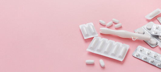 Banner of Woman health concept. Vaginal suppositories, tablets, applicator on pink background, treatment of vaginal infections with smile from candidiasis, thrush, sexually transmitted infections