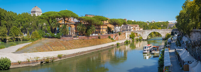 Rome - The panorama of Isola Tiberiana - Tiberian Island with the Ponte Cestio bridge.