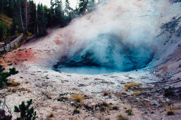 Geyser activity in Yellowstone. Mud Volcano area.