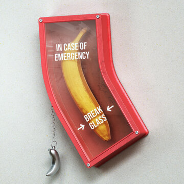 Banana extinguisher labelled "In Case of Emergency, Break Glass"