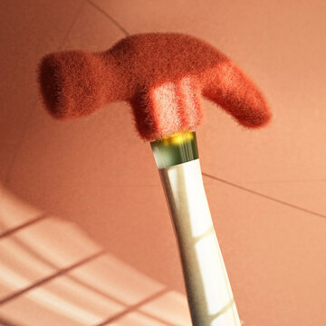 Red hammer tool with furry texture and shadows