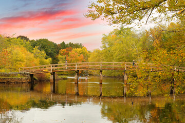 The North Bridge, often colloquially called the Old North Bridge in Concord, Massachusetts at sunset. The bridge is a historic site in Concord, Massachusetts spanning the Concord River.