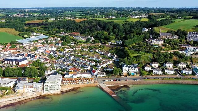 Aerial view of Grouville Bay with The Royal Golf Course in the background