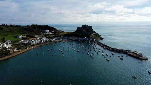 Aerial view of Gorey Harbour with Gorey Castle in the background. Jersey, CI