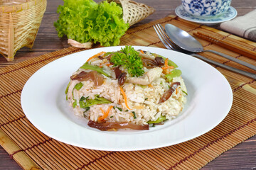 Vegetarian fried rice. Vegetarian fried rice with mixed mushroom, carrot and green vegetable. Vegetarian food