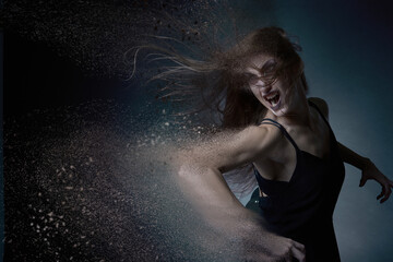 Halloween horror, woman dispersing and dematerializing, screaming in agony, disappearing