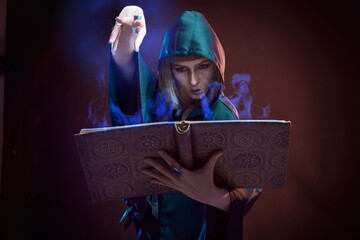 Dark sorceress casting a magic spell with an animal skull