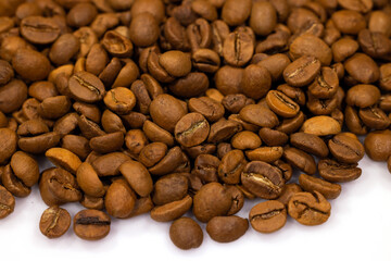 roasted coffee beans isolated in white background