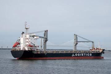 Fototapeta premium A General Logistics Cargo Ship anchored in the Charleston Harbor