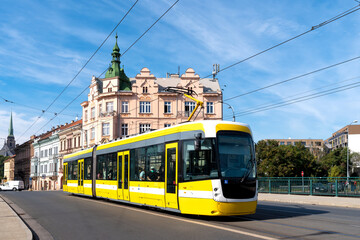 Fototapeta na wymiar Tram runs through the Pilsen city centre, Czech republic