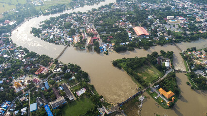 Flood waters overtake a house and rice field at Central of Thailand in 2021. Many buildings are...