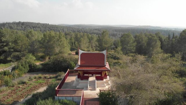 Aerial pullback view from Ben Shemen Forest reveal Traditional Thai Pavilion