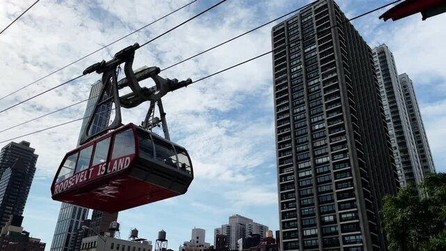 Roosevelt Island Tramway arriving at Tramway Plaza Station in Manhattan New York City