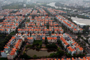 Obraz premium Residential Villa development near river from aerial view