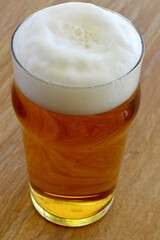 glass of beer on table