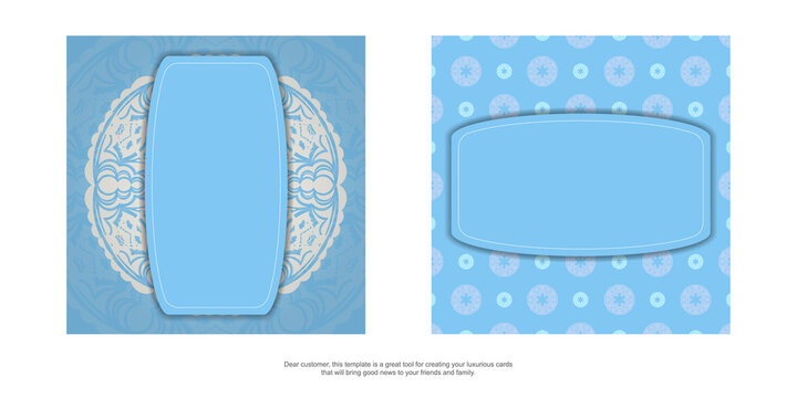 Light blue postcard with Indian white ornaments prepared for typography.