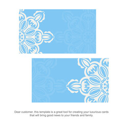 Blue business card with Greek white ornaments for your brand.