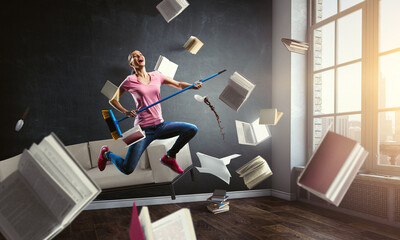 Young and beautiful rock girl playing the electric guitar