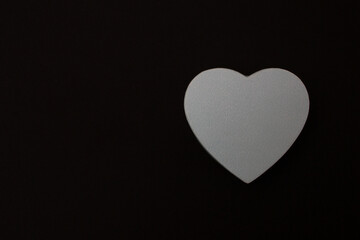 Silver heart icon isolated on black background. love symbol Valentine's Day sign. leave space for text