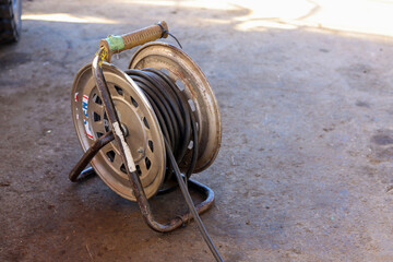 An oblique view of a used cord reel.