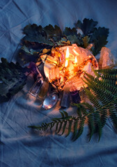 witch altar with crystals, candles, leaves on dark background. Magic Crystal Ritual, wiccan...