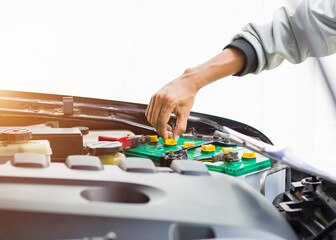 Fototapeta premium Technicians inspect the car's electrical system.