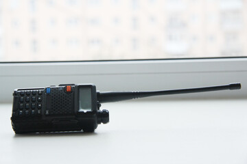 The radio that lies on the window 