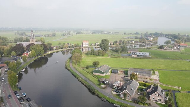 Aerial view of Amstelveen Oudekerk ad Amstel typical dutch landscape and historic village along the Amstel river in The Netherlands.