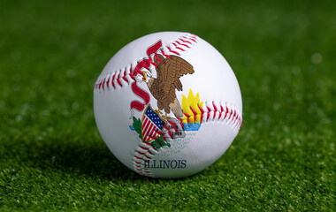 Baseball with Illinois flag on green grass background, close up